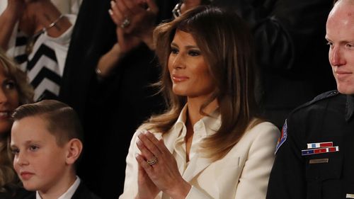 First Lady Melania Trump wore white to the president's address - a colour linked to the suffragette movement. (AAP)