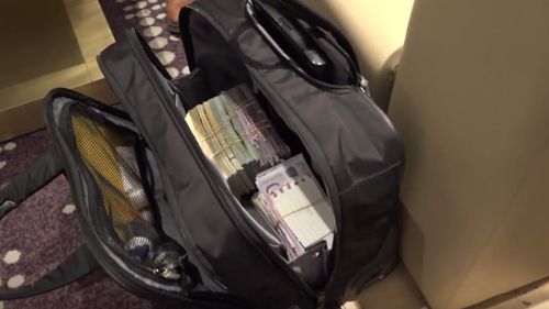 A bag filled with foreign currency banknotes was taken during the arret. (Serbian Interior Ministry)