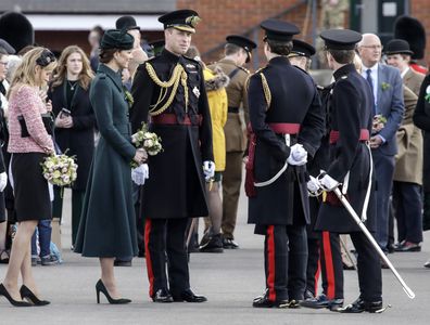 Catherine, Duchess of Cambridge and Prince William, Duke of Cambridge meet members of the regiment as they attend the 1st Battalion Irish Guards' St. Patrick's Day Parade at Mons Barracks on March 17, 2022 in Aldershot, England 