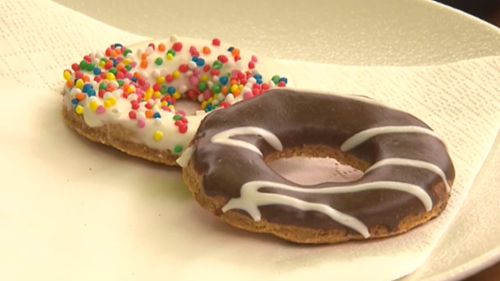 Doggie donuts- of the sprinkled OR chocolate variety- are on offer to four-legged visitors. (AAP)