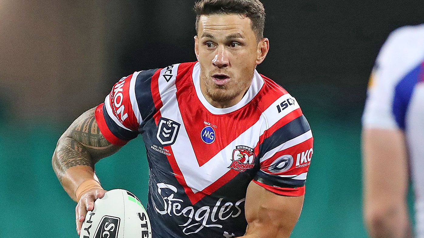 Sonny Bill Williams of the Roosters runs the ball 