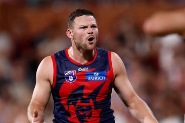 ADELAIDE, AUSTRALIA - APRIL 12: Steven May of the Demons speaks with the umpire during the 2025 AFL Round 05 match between the Melbourne Demons and the Essendon Bombers at Adelaide Oval on April 12, 2025 in Adelaide, Australia. (Photo by Michael Willson/AFL Photos via Getty Images)