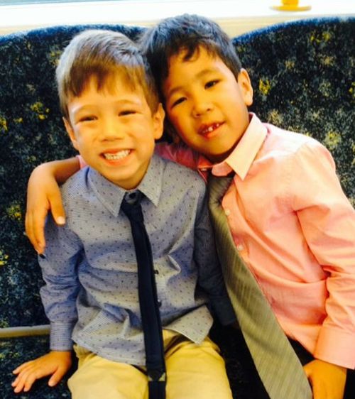 Josiah and Kaleb celebrate  the day that they were adopted after years in the foster care system. Picture: Supplied