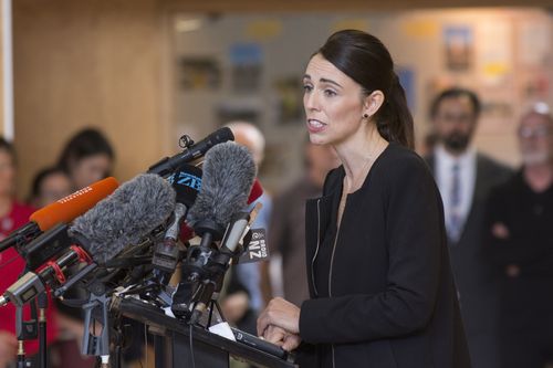 New Zealand Prime Minister Jacinda Ardern speaks to students at the Cashmere High School in Christchurch after fellow classmates were killed. (AAP Image/SNPA, David Alexander) 