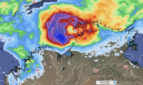 A tropical cyclone watch has been issued for Darwin as a low pressure system gains strength in the Timor Sea.