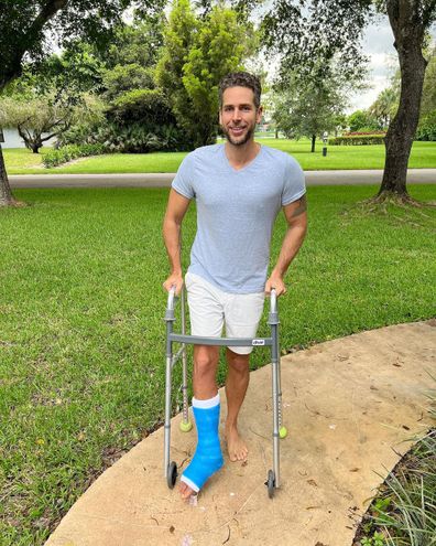 Casey Woods reveals his cast and crutches.