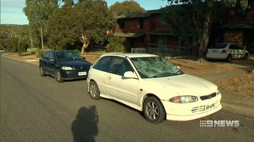 Cars were damaged and a man was bashed during the violence. (9NEWS)