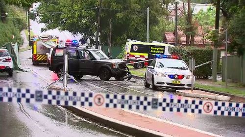 The crash closed The Esplanade as emergency services worked to clear the wreckage amid Wednesday's torrential rain.