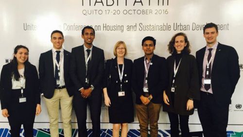 Julian Simpson (far right) at a conference in Ecuador. (Global Voices)