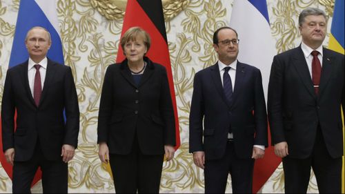 Vladimir Putin, Angela Merkel, Francois Hollande and Petro Poroshenko. (AAP)