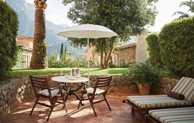 La Residencia uegsts can relax in their own private terrace, complete with daybed and a dining table for two.