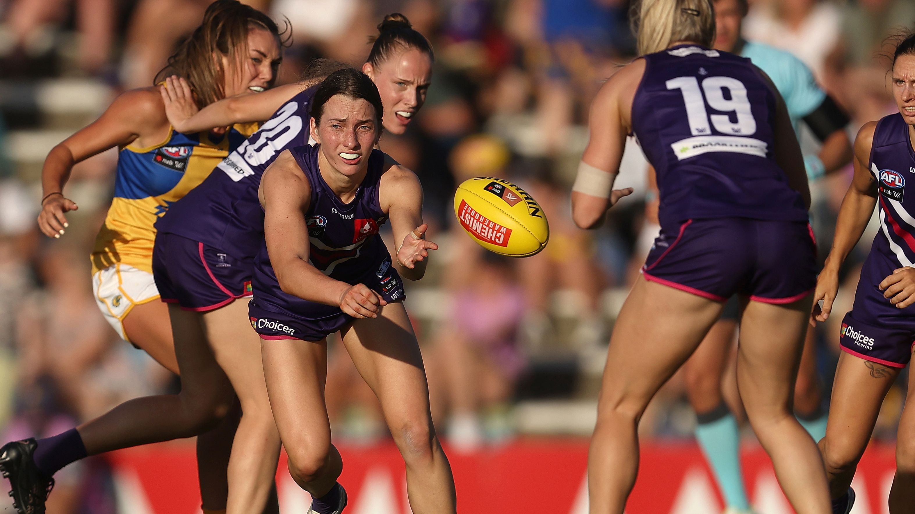 Jessica Low of the Dockers in action during the round one AFLW match between the Fremantle Dockers and the West Coast Eagles at Fremantle Oval.