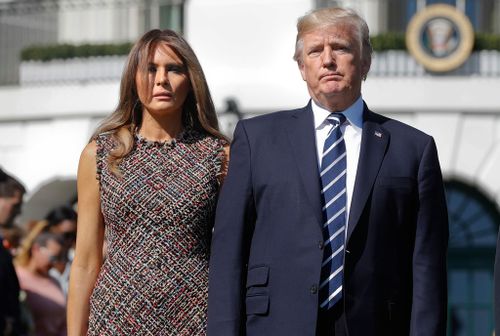 President Donald Trump and First Lady Melania stage a silent tribute to the victims shot from the 32nd floor of the the Mandalay Bay Casino.