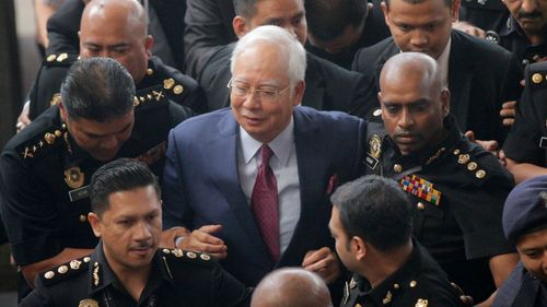 Najib Razak has been charged with criminal breach of trust. (AAP)