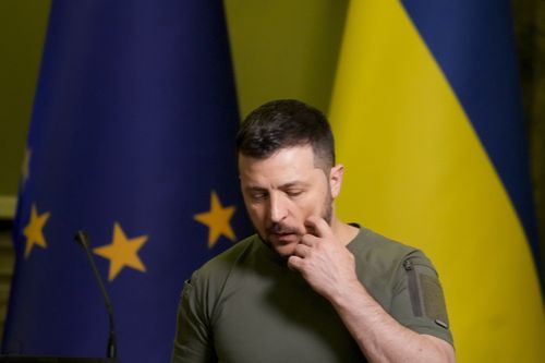 Ukraine President Volodymyr Zelenskyy leaves after a joint press conference with European Commission President Ursula von der Leyen in Kyiv, Ukraine, Saturday, June 11, 2022. 