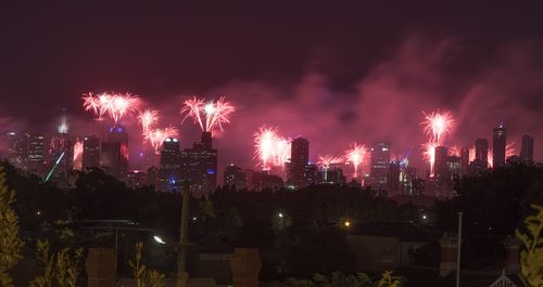 The midnight fireworks from Ruckers Hill in Northcote during New Year's Eve celebrations in Melbourne. (AAP)