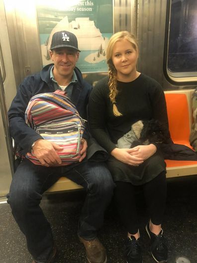 Schumer, 44, announced her split from Chris Fischer, 45, in a casually worded Instagram post, accompanied by a photo of them sitting side-by-side on the train. 