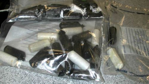 Hundreds of heroin pellets found inside woman stopped at Sydney Airport