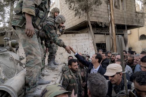 In the videos, Assad makes no mention of his own role in the conflict or the suffering inflicted on by his regime's five-year siege of  eastern Ghouta. (AAP)