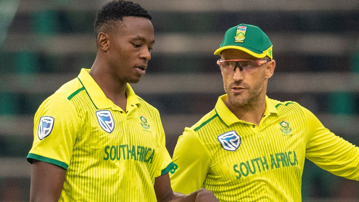 South Africa&#x27;s Faf du Plessis, right, has a word with bowler Kagiso Rabada 