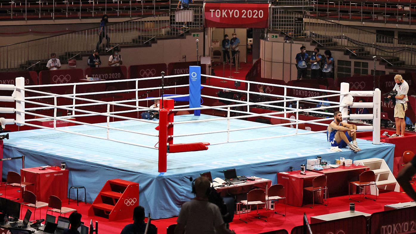 Furious French boxer throws tantrum after disqualification for headbutting