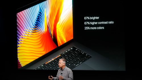 Apple Senior Vice President of Worldwide Marketing Phil Schiller introduces the all-new MacBook Pro during a product launch event on October 27, 2016 in Cupertino, California. (AFP)