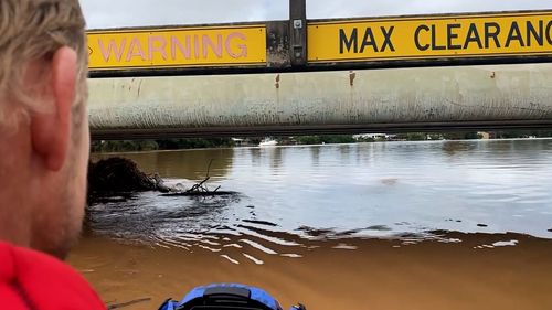 nsw weather update; Murwillumbah  floods mick fanning jet ski rescue