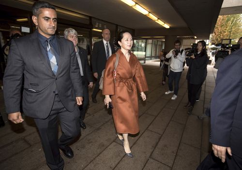 Huawei chief financial officer Meng Wanzhou, who is out on bail and remains under partial house arrest after she was detained last year at the behest of American authorities, leaves court during a lunch break from a hearing, in Vancouver.