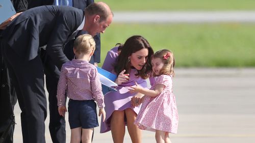 Princess Charlotte didn't appear too impressed at the sight of the helicopter. (AAP)