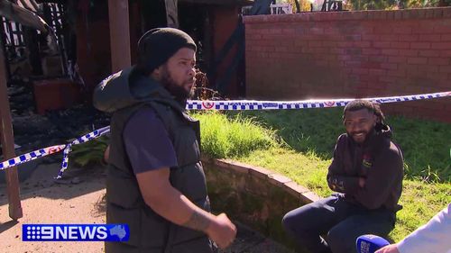 Housemates jump for their lives from burning Sydney home