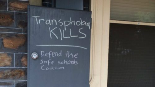 "Transphobia kills": a slogan scrawled on Mr Bernardi's office. (Tracy Alexander/9NEWS)