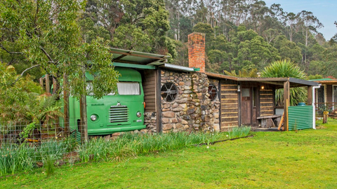 A charming three-bedroom shack with converted bus in Gunns Plains, Tasmania, sold for just $62,000.