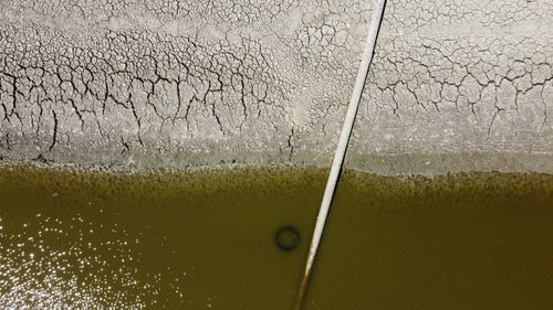 An aerial photograph taken on August 10, 2022 shows Euston Estate farm's depleted reservoirs, in Euston, outside Thetford.  