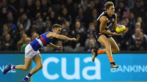 Charlie Curnow led a furious Carlton comeback with a career-best seven goals.