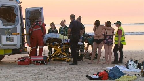 A woman has been saved from drowning at a popular beach south of Adelaide.