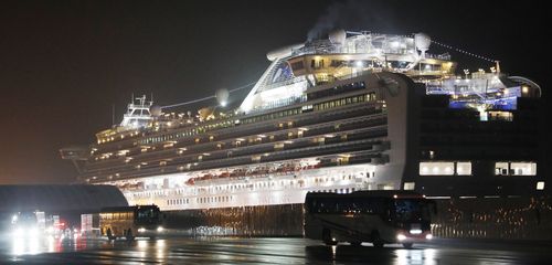 Buses of the Japan Self Defence Forces leave Daikoku Futo Wharf where the Diamond Princess is anchored in Yokohama. Approximately 380 US passengers hopped on buses to go to Haneda International Airport to board two chartered flights by US government. 