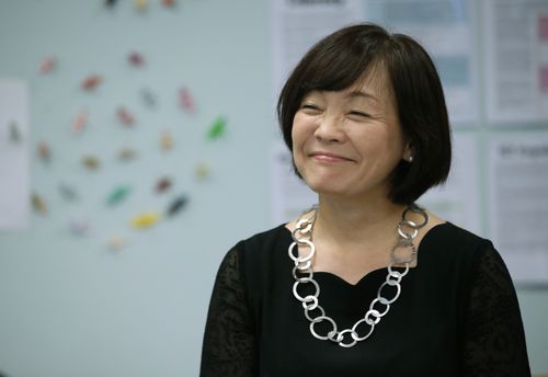 Akie Abe. the wife of Japanese Prime Minister Shinzo Abe, smiles during a visit to a senior elective Japanese language class at Darwin High School.