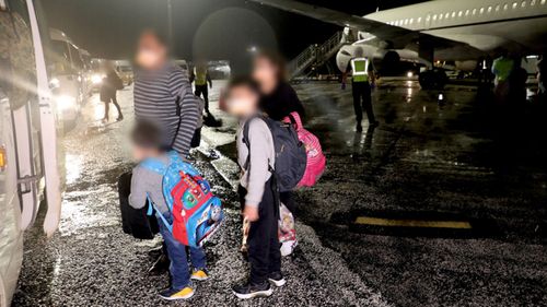 A family arrives at Christmas Island.