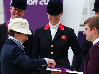 Princess Anne presents Zara with her medal