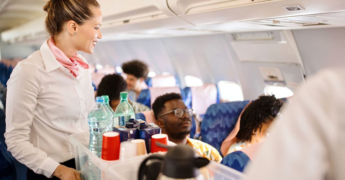 When should you eat on a long-haul flight, according to a flight attendant