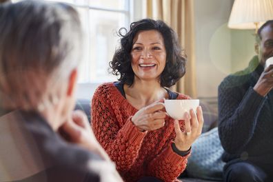 Woman and man having coffee