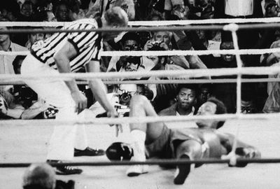Foreman got up at the count of nine, but the referee stopped the bout.