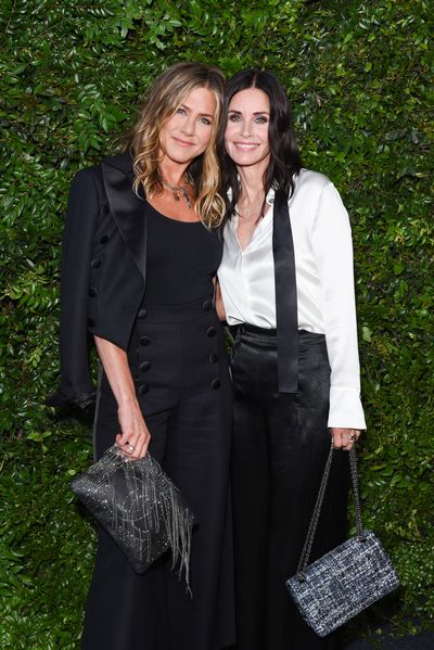Jennifer Aniston and Courtney Cox in Chanel at the Chanel benefit For NRDC in Malibu, June, 2018