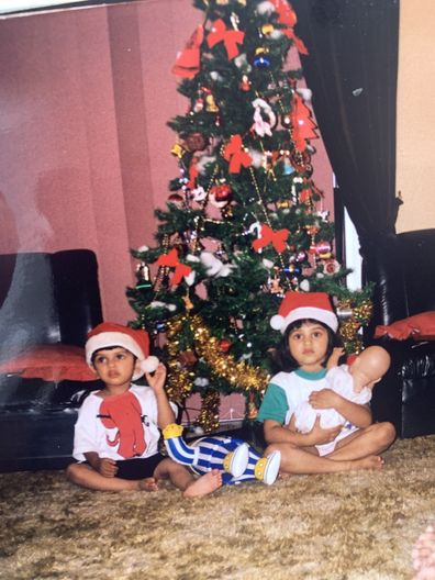 Maria Thattil and her siblings as kids at Christmas.
