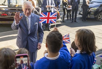 King Charles III speaks to young children as he and Camilla, the Queen Consort visit Project Zero in Walthamstow, East London, Tuesday, Oct.18, 2022