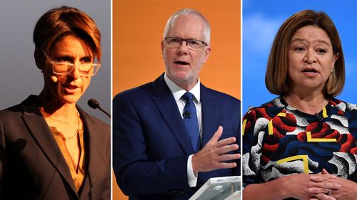 Political pressure is mounting on the ABC chair, Justin Milne (centre), after revelations he ordered sacked managing director, Michelle Guthrie (right), to get rid of  senior presenter Emma Alberici (left) because the Turnbull Government “hates her”.