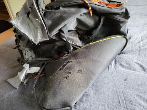 The bag badly damaged, after a Qantas flight.