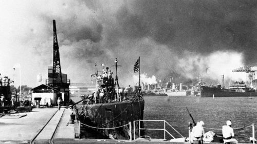 USS Tautog (left) and USS Narwhal (right) during the 1941 attack on Pearl Harbor. (AAP)