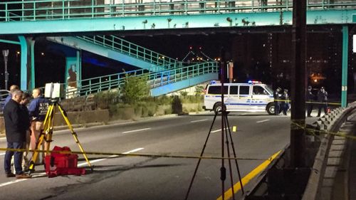 New York police officer fatally shot in head while chasing suspect