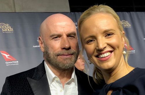 John Travolta with 9News reporter Alexis Daish.